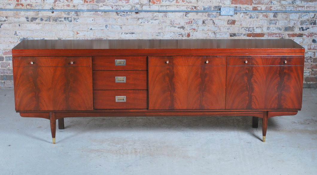 Mid Century teak and mahogany long sideboard with brass handles by Greaves&Thomas, stamped 1966.