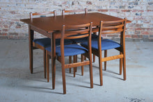 Load image into Gallery viewer, Mid Century extending teak dining table and 6 chairs, circa 1960s.
