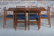 Load image into Gallery viewer, Mid Century extending teak dining table and 6 chairs, circa 1960s.
