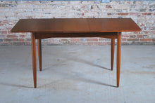 Load image into Gallery viewer, Mid Century extending teak dining table and 6 chairs, circa 1960s.
