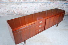Load image into Gallery viewer, Mid Century teak and mahogany long sideboard with brass handles by Greaves&amp;Thomas, stamped 1966.
