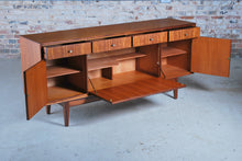 Load image into Gallery viewer, Mid Century solid teak sideboard with brass handles by Greaves&amp;Thomas, circa 1960s.
