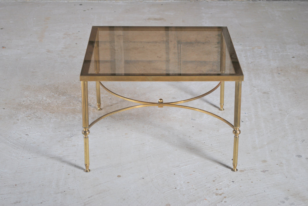 Mid Century Hollywood Regency Maison Jansen style brass and glass square coffee table, France, circa 1970s.