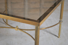 Load image into Gallery viewer, Mid Century Hollywood Regency Maison Jansen style brass and glass square coffee table, France, circa 1970s.
