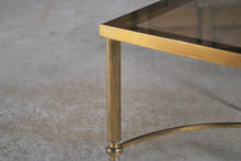Load image into Gallery viewer, Mid Century Hollywood Regency Maison Jansen style brass and glass square coffee table, France, circa 1970s.
