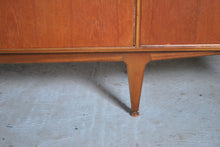 Load image into Gallery viewer, A Mid Century Dunvegan teak sideboard designed by Tom Robertson and manufactured by A.H. McIntosh of Kirkcaldy, Scotland, circa 1960s.
