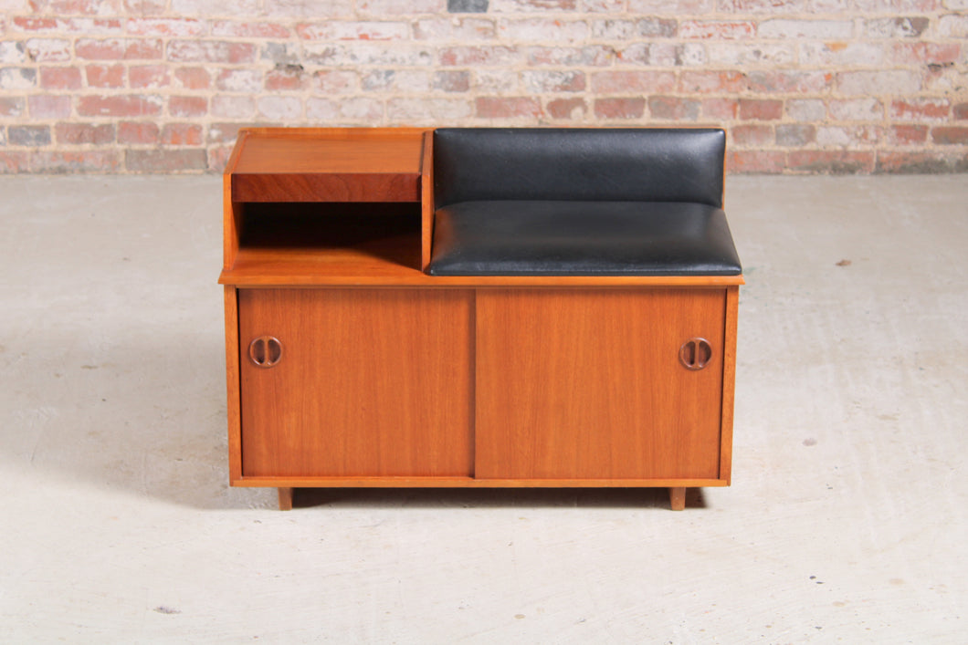 Mid Century teak telephone seat with black vinyl upholstery by Chippy, circa 1960s.