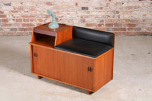 Load image into Gallery viewer, Mid Century teak telephone seat with black vinyl upholstery by Chippy, circa 1960s.

