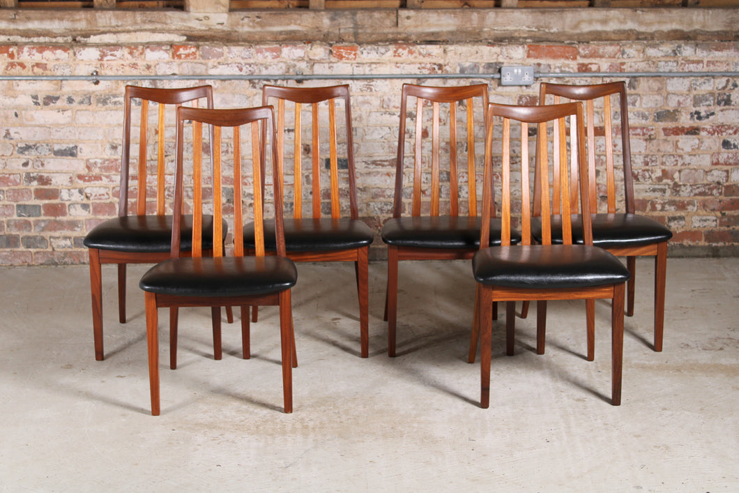 Set of 6 Mid Century G-plan Fresco afromosia dining chairs reupholstered with premium black vinyl.