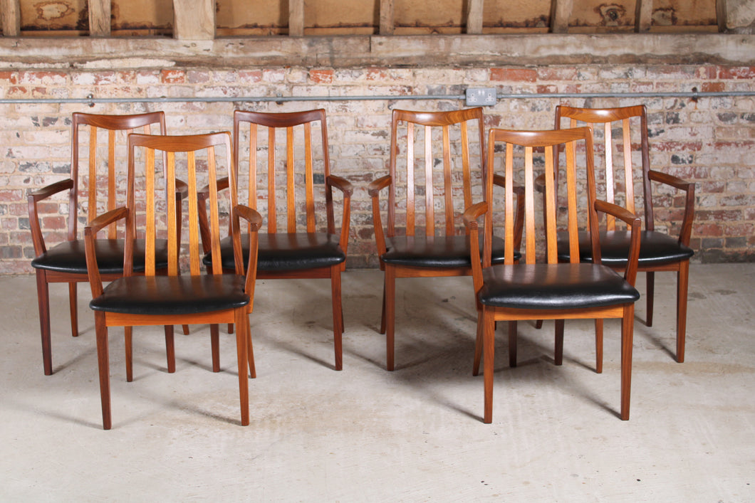 Set of 6 Mid Century G-plan Fresco afromosia carver dining chairs reupholstered with premium black vinyl.