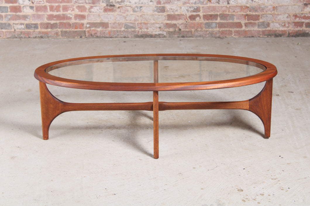 Mid Century solid teak and glass oval coffee table by Stonehill, England, circa 1960s.