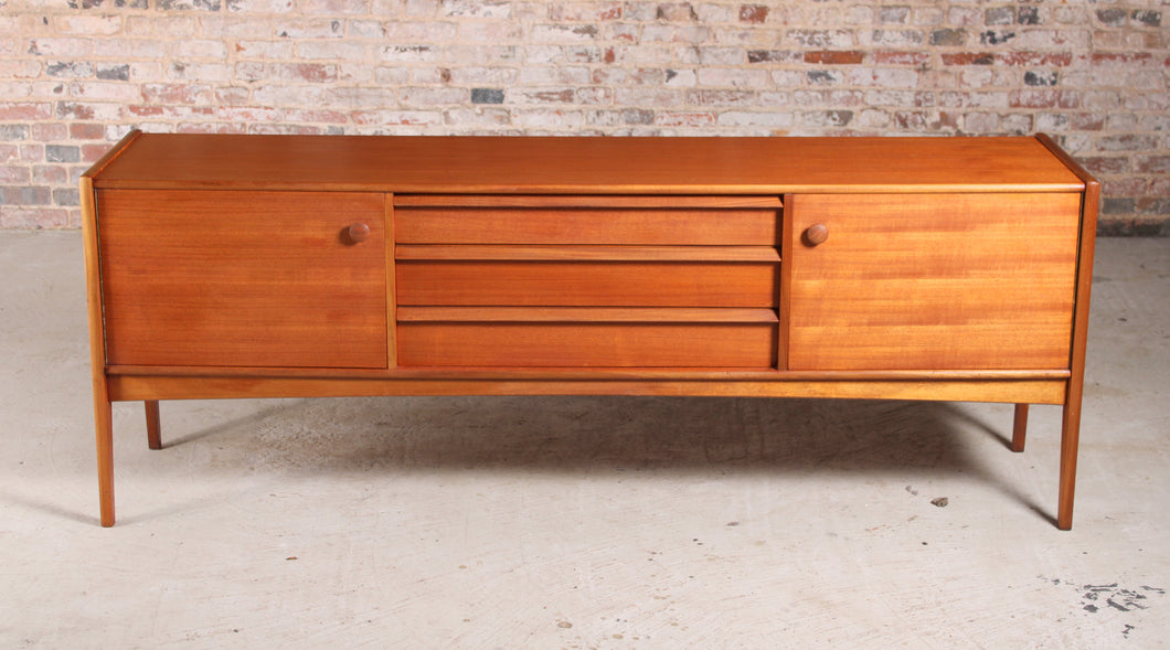 Mid Century teak sideboard by Younger, England, circa 1960s.