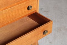 Load image into Gallery viewer, Mid Century teak chest of 5 drawers with a curved top and splayed legs, circa 1960s.
