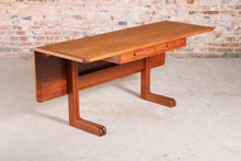 Load image into Gallery viewer, A Midcentury metamorphic teak drop leaf dining table/desk.
