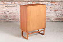 Load image into Gallery viewer, Danish style Mid Century teak chest of 5 drawers with carved teak handles, circa 1960s.
