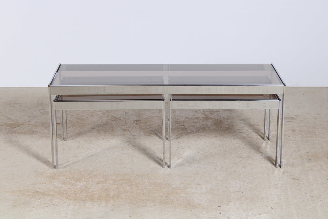 Mid Century Merrow Associates chrome and smoked glass nest of tables.