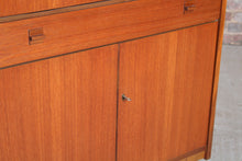 Load image into Gallery viewer, Mid Century teak drinks cabinet by Nathan, England, circa 1960s
