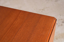 Load image into Gallery viewer, Mid Century drop-leaf teak dining table, circa 1960s.
