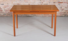 Load image into Gallery viewer, Danish Mid Century extending teak dining table by AM Mobler, circa 1960s.

