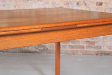Load image into Gallery viewer, Danish Mid Century extending teak dining table by AM Mobler, circa 1960s.
