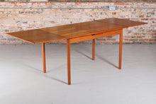 Load image into Gallery viewer, Danish Mid Century extending teak dining table by AM Mobler, circa 1960s.
