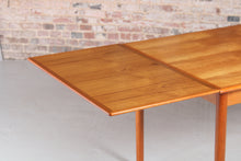 Load image into Gallery viewer, Danish Mid Century extending teak dining table by AM Mobler, circa 1960s.
