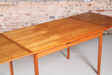 Load image into Gallery viewer, Danish Mid Century extending teak dining table by AM Mobler, circa 1960s.
