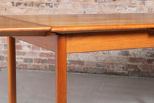 Load image into Gallery viewer, Danish Mid Century extending teak dining table by AM Mobler, circa 1960s.
