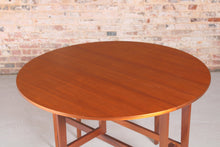 Load image into Gallery viewer, Mid Century drop-leaf teak dining table, circa 1960s.
