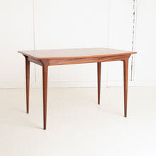Load image into Gallery viewer, A British Mid Century teak extending dining table and four chairs designed by McIntosh, Scotland circa 1960s.
