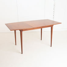 Load image into Gallery viewer, A British Mid Century teak extending dining table and four chairs designed by McIntosh, Scotland circa 1960s.
