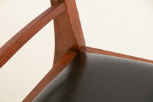 Load image into Gallery viewer, A British Mid Century teak extending dining table and four chairs designed by McIntosh, Scotland circa 1960s.
