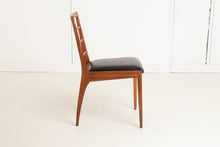Load image into Gallery viewer, A British Mid Century teak extending dining table and four chairs designed by McIntosh, Scotland circa 1960s.
