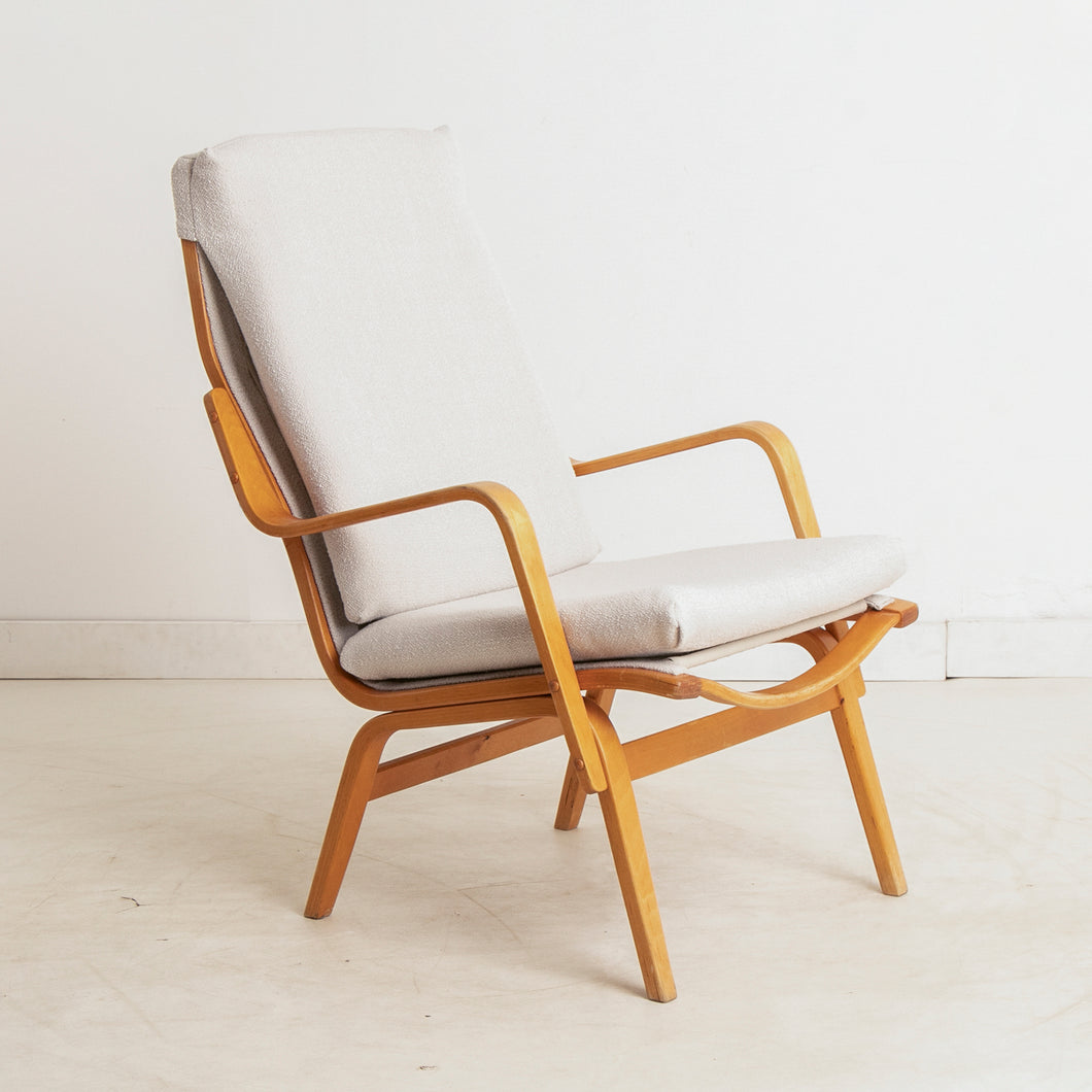 A Finnish mid century armchair designed by Ilmari Lappalainen for Asko, circa 1960s.